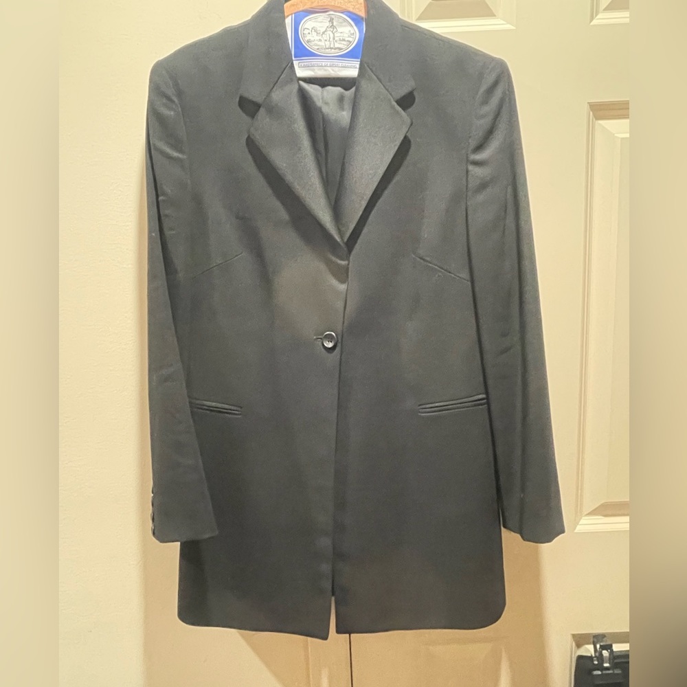 Woman’s tuxedo black suit. Very classy and elegant. By Byblos Italian designer.